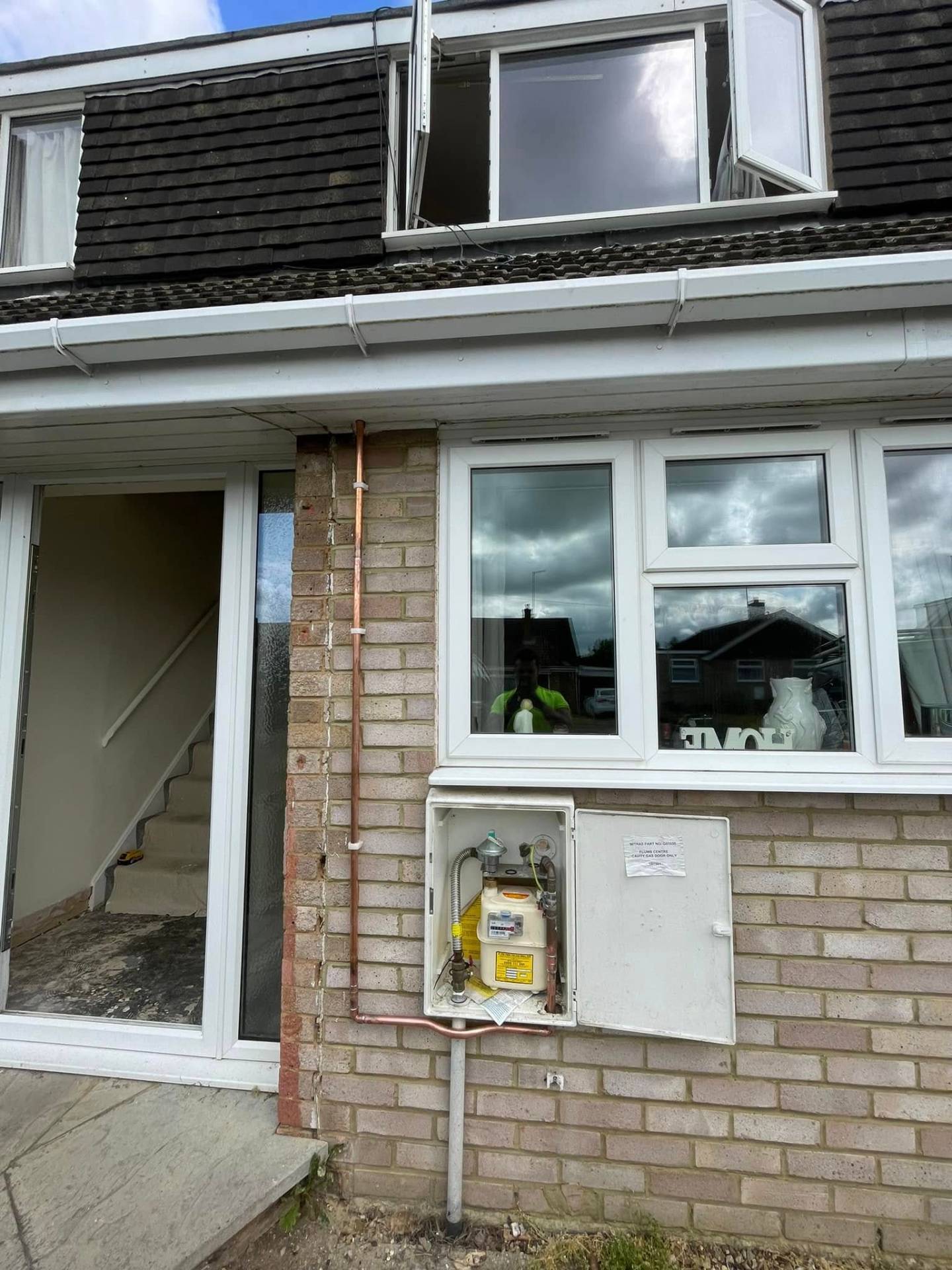 External copper gas pipework run from meter box up the brickwork on a Northampton home by Gas Safe engineer J Lamb Plumbing & Heating
